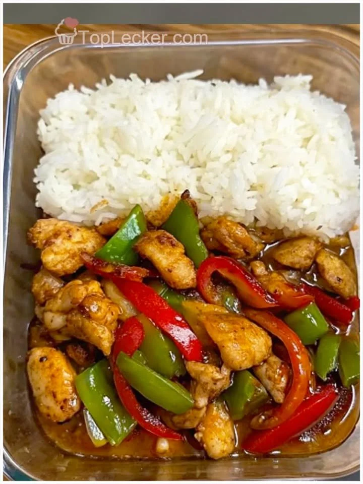 Hähnchenpfanne mit Paprika und Reis