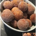 Leckere Quarkbällchen mit Zimt-Zucker auf einem Teller