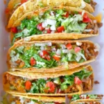 Gebackene Hähnchentacos mit frischen Zutaten und delikaten Gewürzen