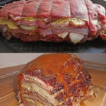 Schichtbraten in Senfsauce auf einem Teller serviert, dekoriert mit frischen Kräutern.