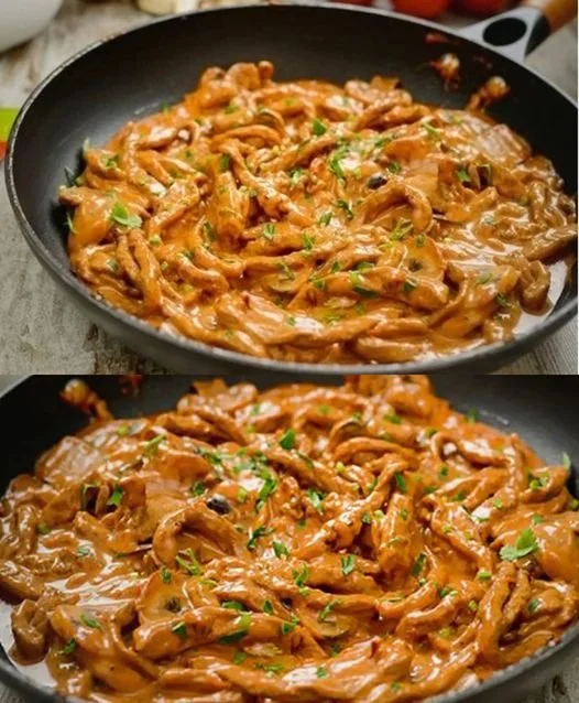 Schnitzelstreifen in leckerer Senfsahnesauce serviert