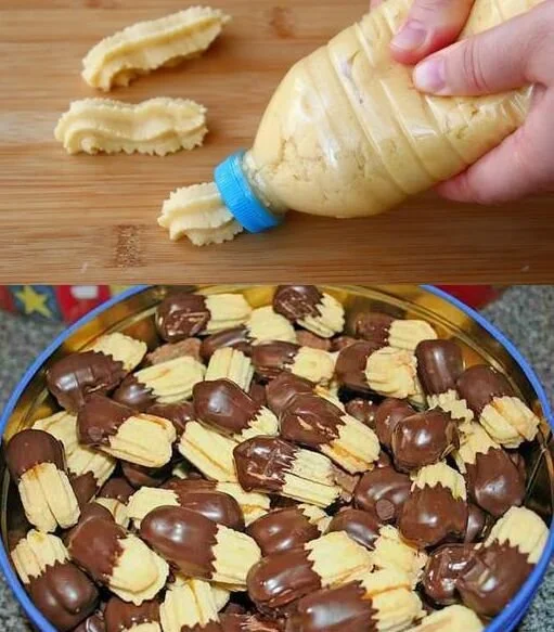 Leckeres Spritzgebäck auf einem Weihnachts-Teller dekoriert