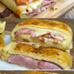 Blätterteigstrudel mit Schinken und Käse auf einem Teller