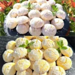 Frisch gebackene Zitronenkekse auf einem Teller, ideal für süße Leckereien.